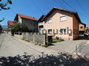 Two houses on a plot of land with a registered area of ​​409m2, located in an extremely attractive micro-location in the Dobrinja settlement, Novi Grad
